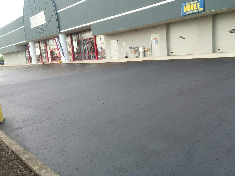 Retail building with new asphalt surface